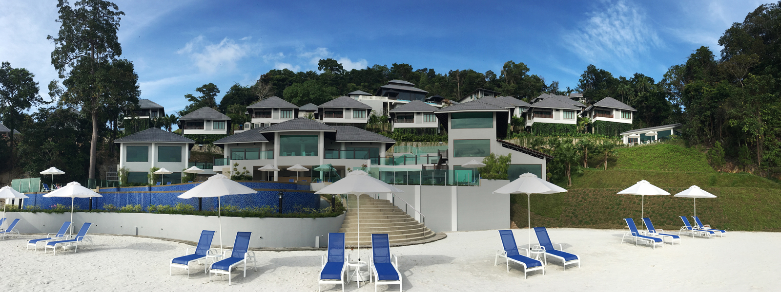 Beach chalets surrounded by lush greenery